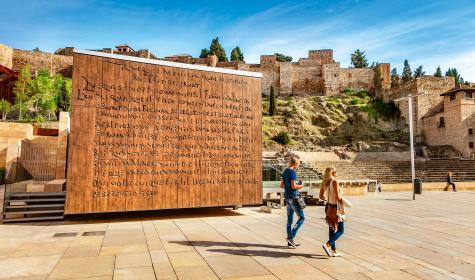 In the foreground Interpretation center of the Roman theater. In the background Alcazaba. Malaga.